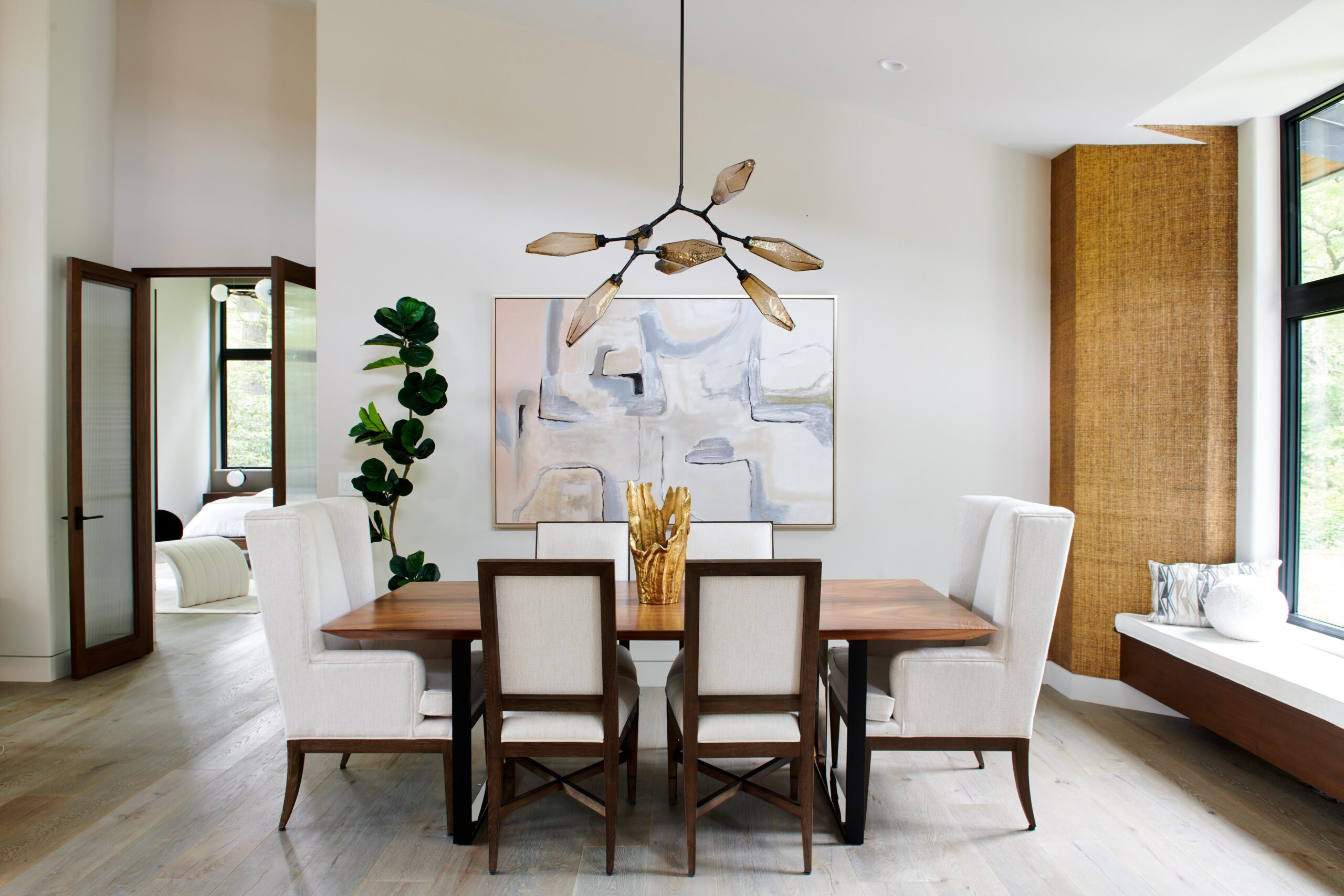 _dining_room_with_a_large_painting_on_the_wall_brdb_highlands_living_room